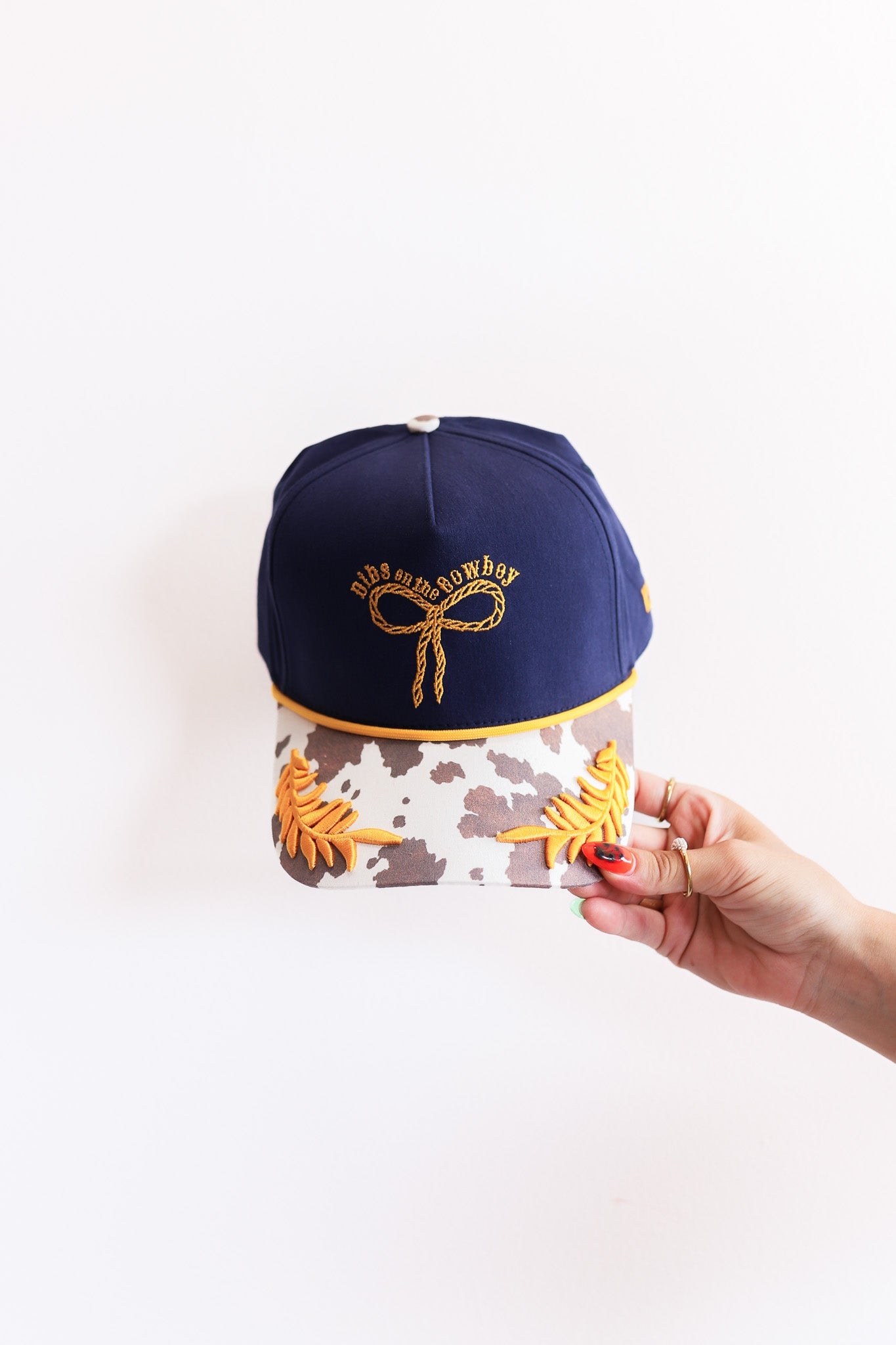 DIBS ON THE COWBOY TRUCKER HAT