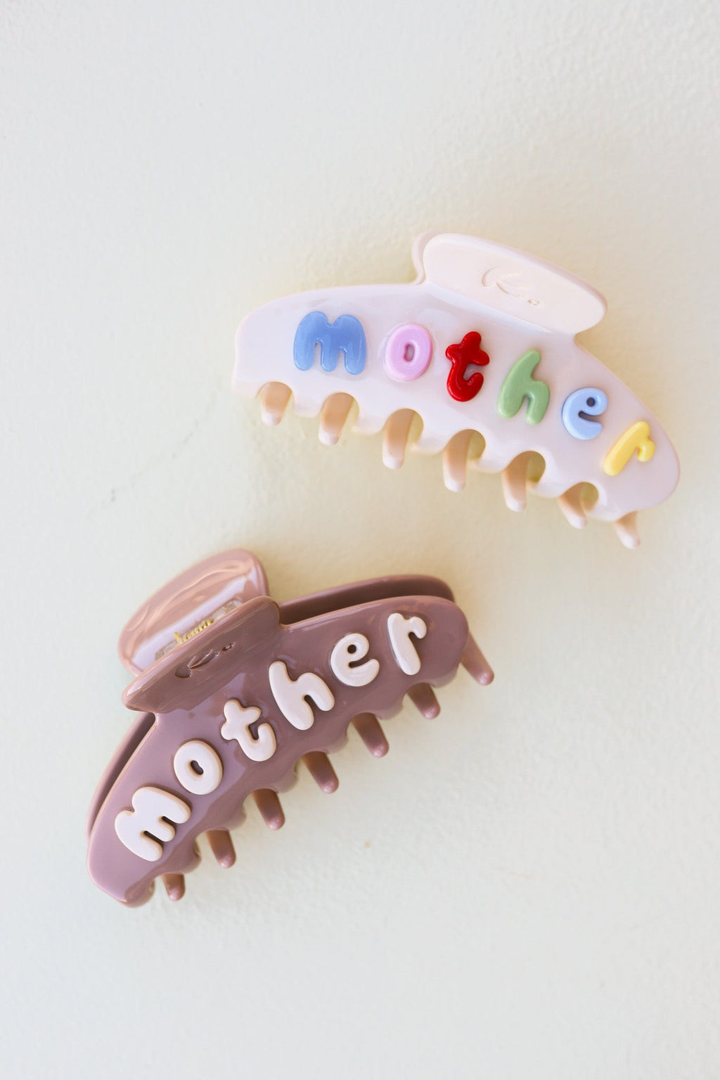 MOTHERHOOD CLAW