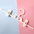 360 Degree Rotatable Non-Slip Multifunctional Clothes Hanger Home Wardrobe Traceless Pants Hanging Clip(Milk White)